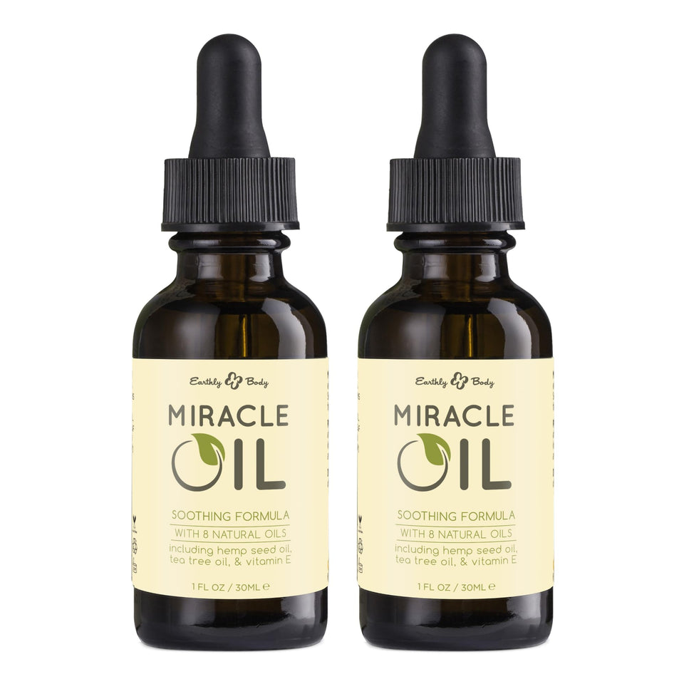 Earthly Body Miracle Oil bottle pour for hydration and smooth skin