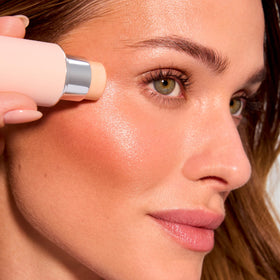 EarthsCure Glow Glaze highlighter stick suitable for face and body highlighting.