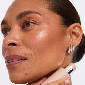 EarthsCure Glow Glaze highlighter stick uses hydrating formula for comfortable wear.