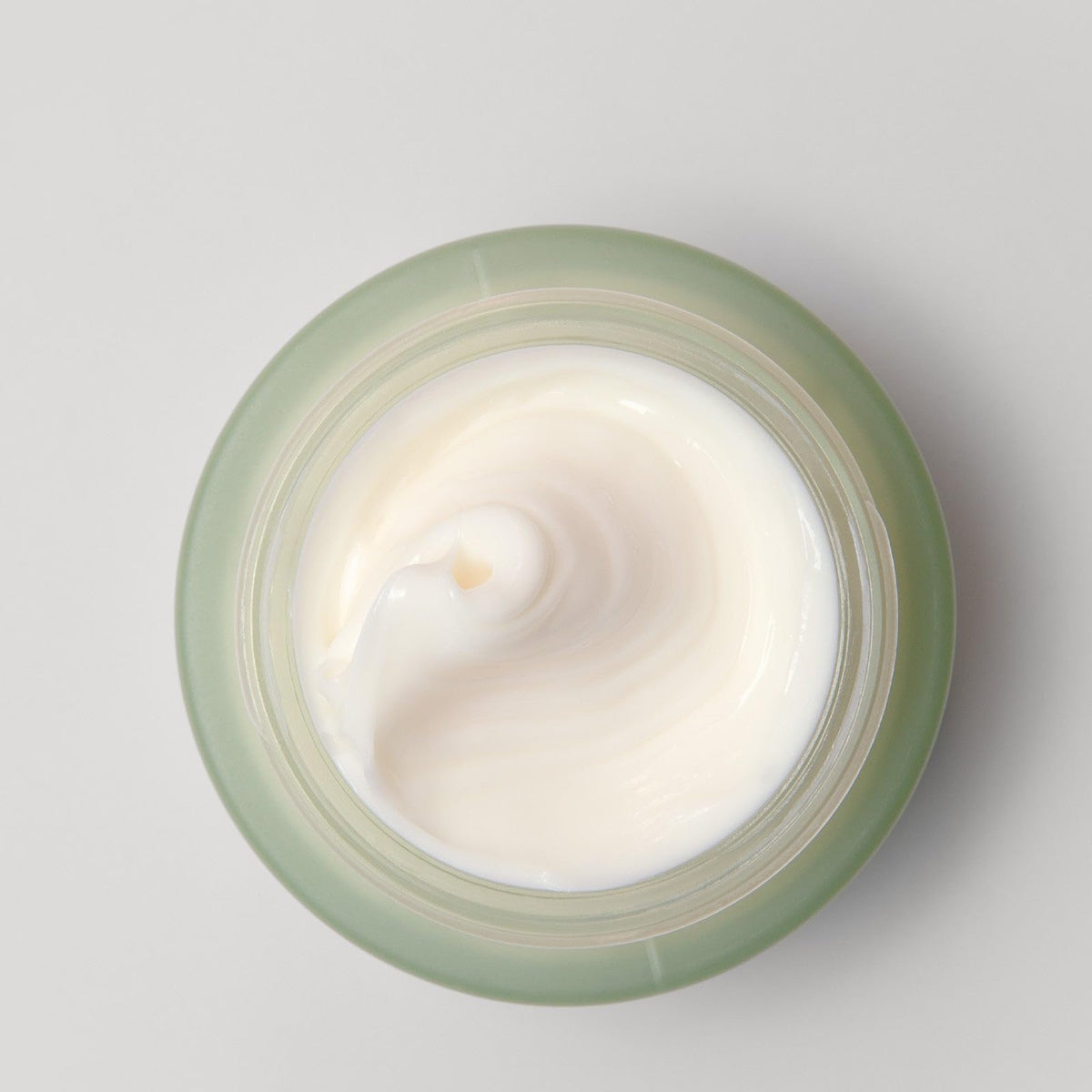 EarthsCure Hybrid Retinol Cream swirl texture emphasizes smooth skin feel