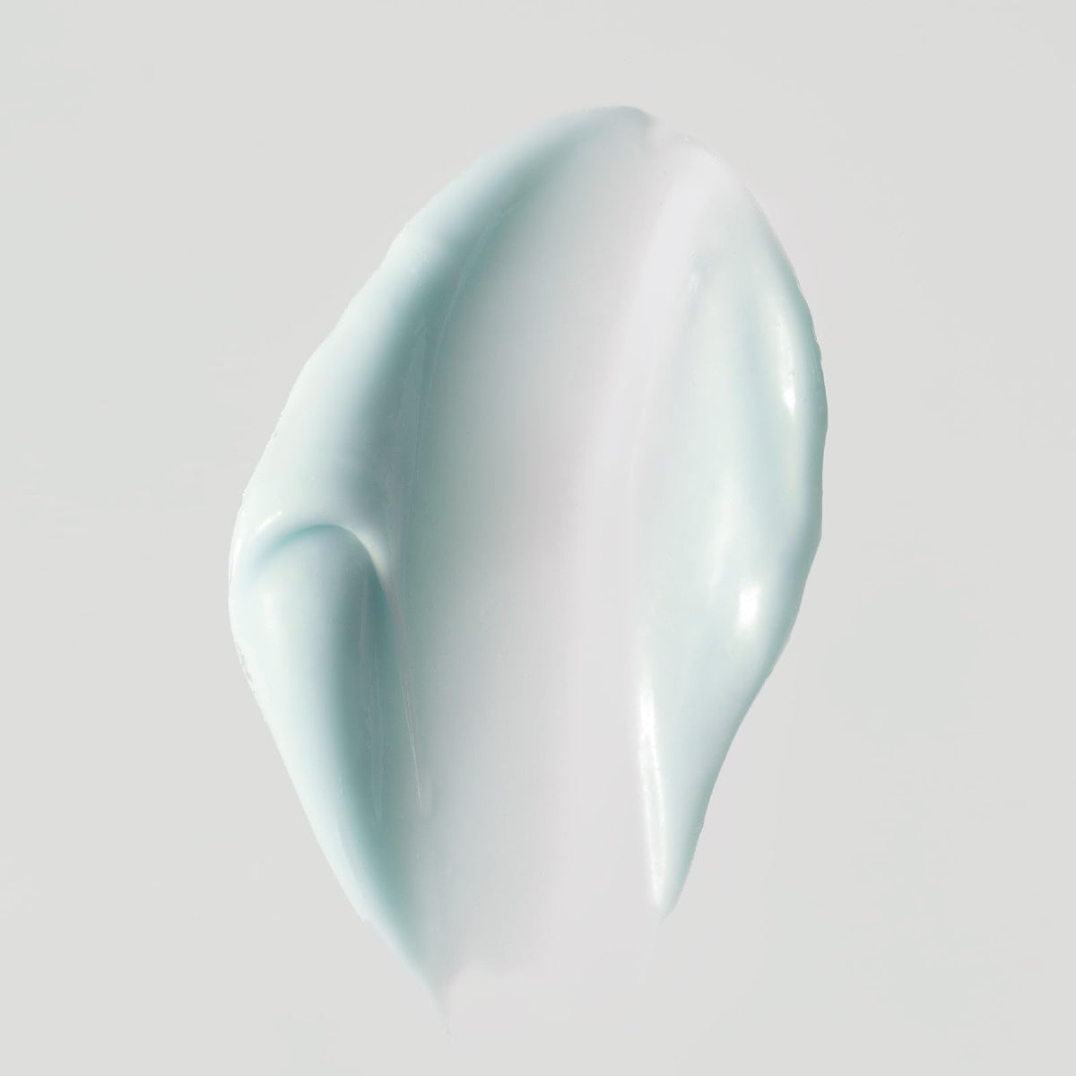 Close-up of EarthsCure Nano Peptide Moisturizer texture showing rich, non-greasy absorption.