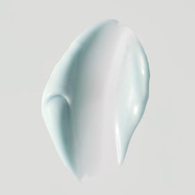 Close-up of EarthsCure Nano Peptide Moisturizer texture showing rich, non-greasy absorption.
