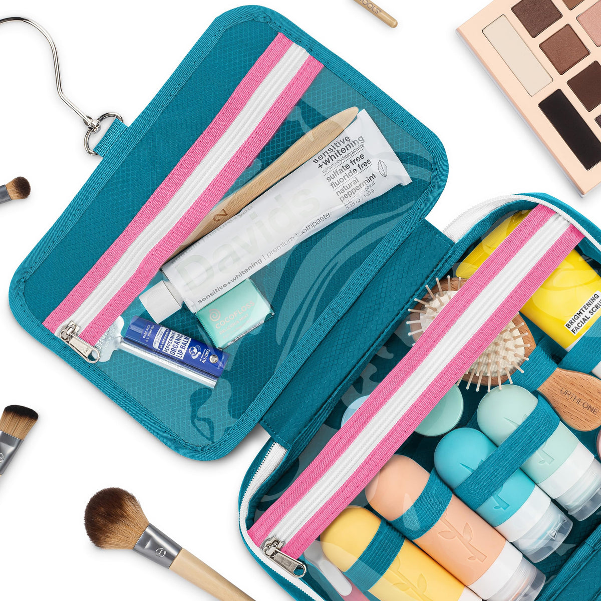 Eco Sun teal bag open with clear pockets for quick item identification.
