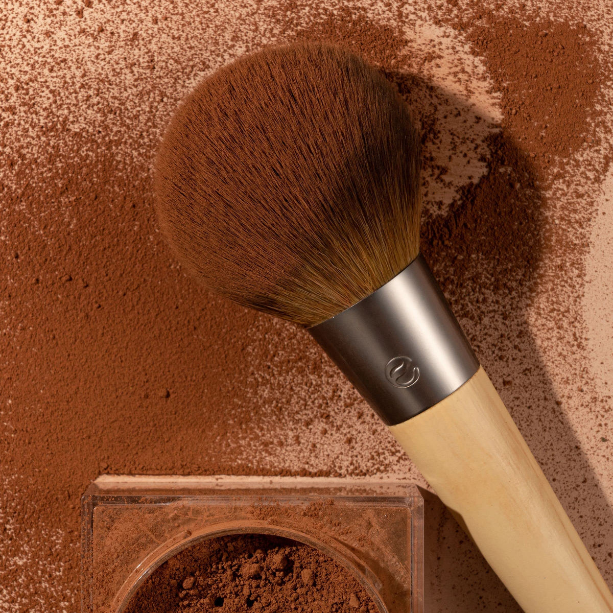 EcoTools Full Powder Brush aluminum ferrule and soft bristles provide control.
