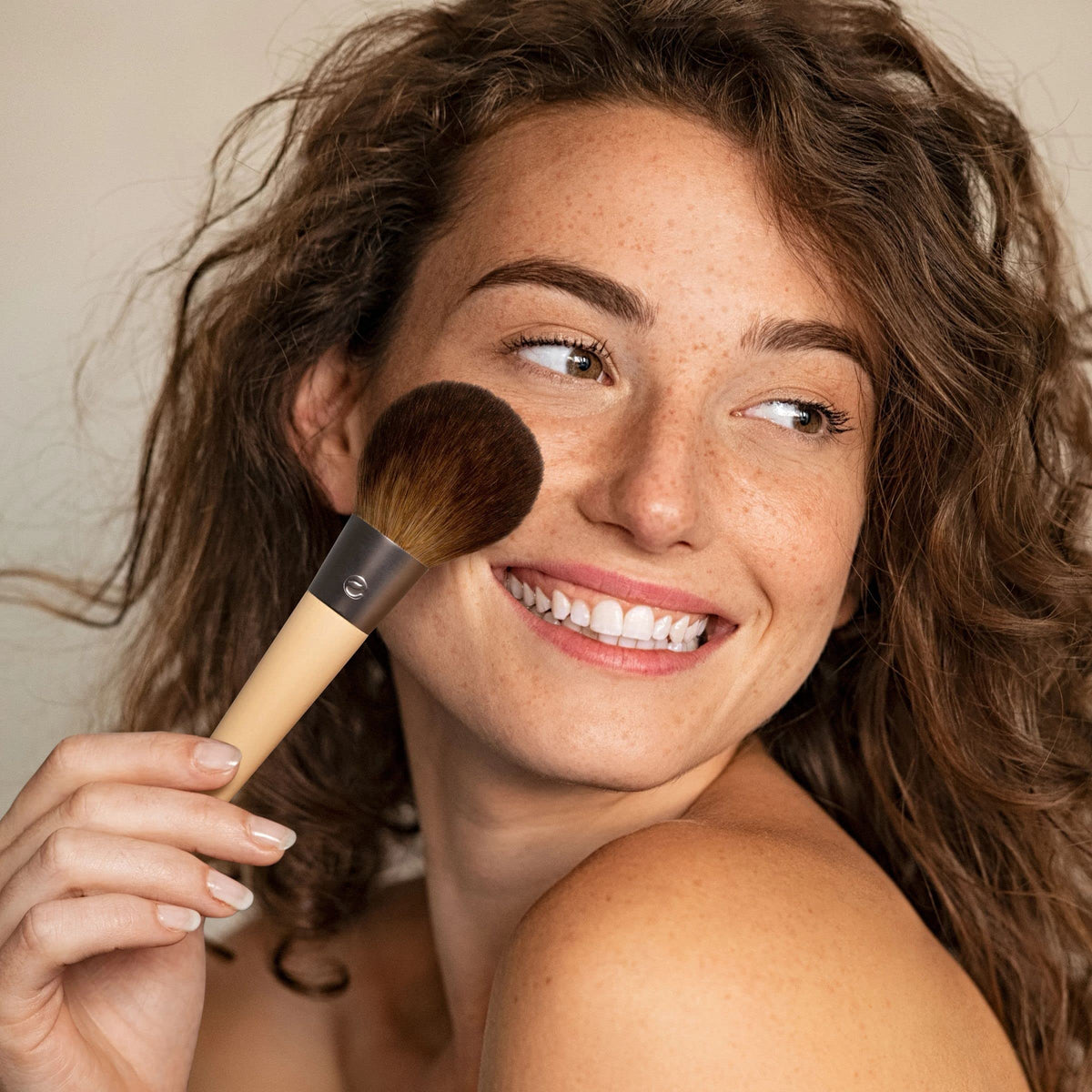 EcoTools Full Powder Brush bamboo handle supports sustainable beauty tools.