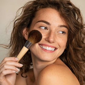 EcoTools Full Powder Brush bamboo handle supports sustainable beauty tools.
