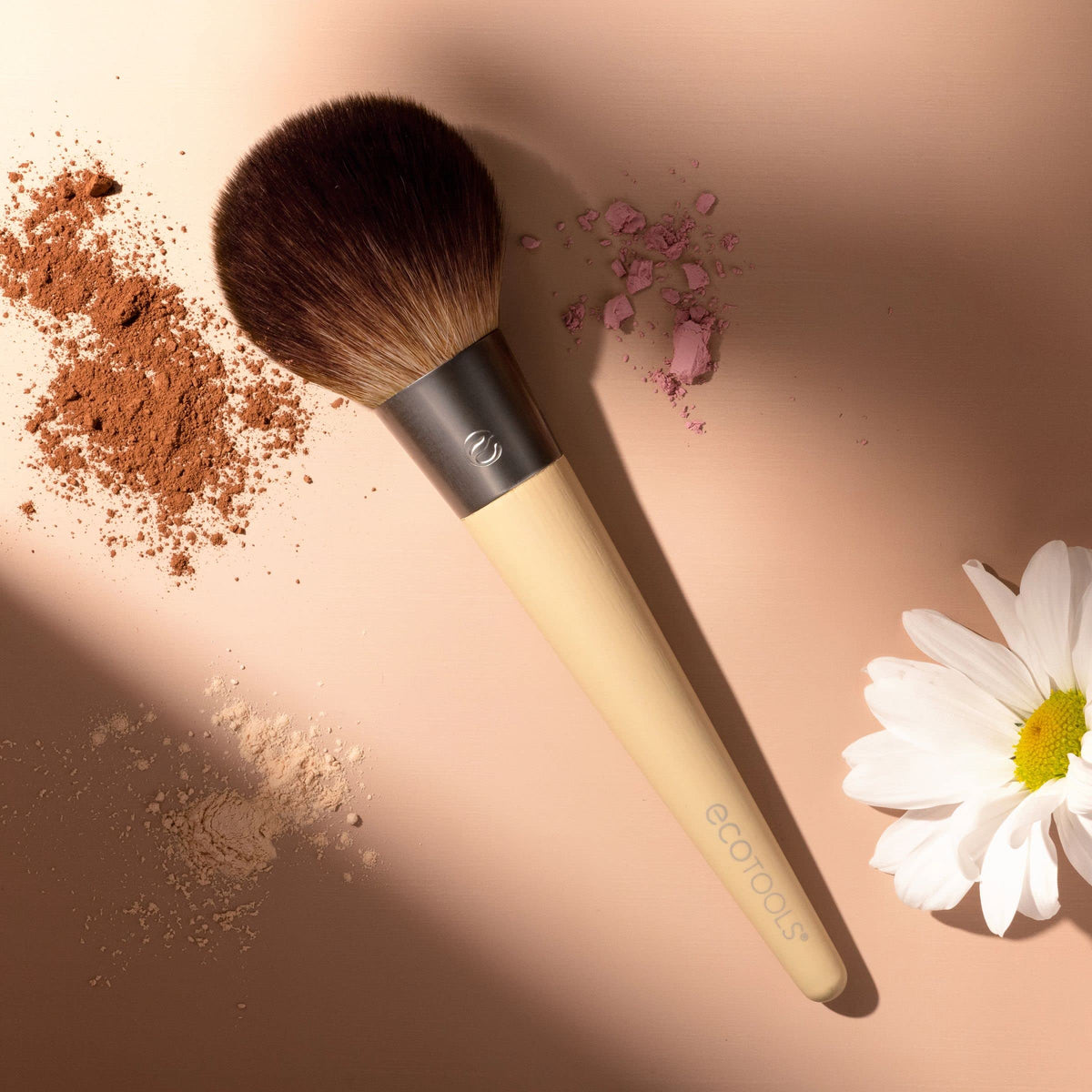 EcoTools Full Powder Brush synthetic bristles enable vegan, cruelty-free use.