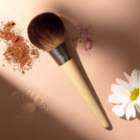 EcoTools Full Powder Brush synthetic bristles enable vegan, cruelty-free use.