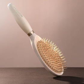 EcoTools Shine Activating Detangler heat resistant up to 240°F for styling.
