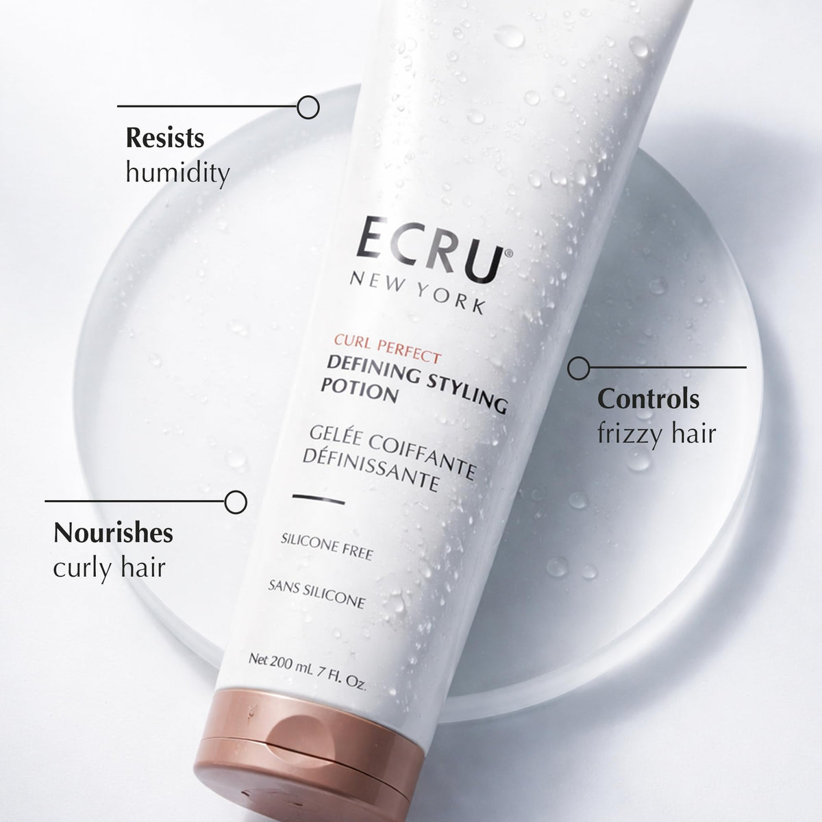ECRU New York Curl Perfect Defining Potion hair application on damp strands defines curls.
