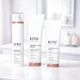 ECRU New York Curl Perfect Defining Potion lightweight formula supports all curl patterns.