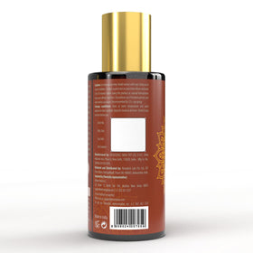 Scalp application of EKMIVEDA Castor Rosemary Oil during routine.