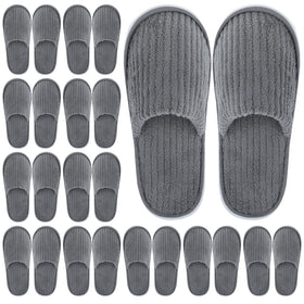 Elcoho closed-toe spa slippers in packaging for hotel guests, convenient and hygienic.