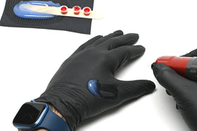 Professional artist uses Guardian Tattoo Glide Gel in a studio.