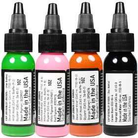 Studio setup with colorful ink collection ready for client sessions