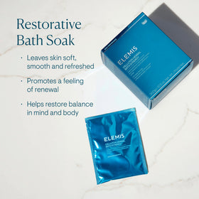 Elemis Cellutox bath sachet in warm water releasing herbal detox aroma.