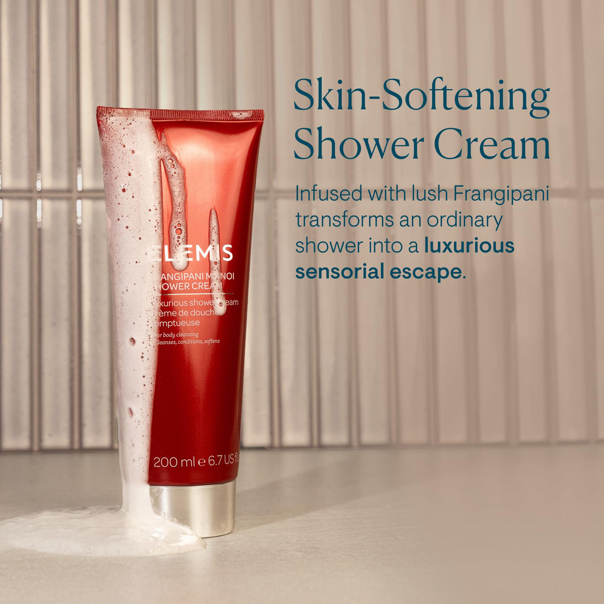 Elemis Frangipani Monoi lather close-up showcasing luxurious foam and scent.