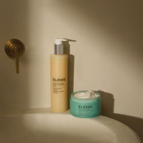Brand-label product on countertop signaling premium skincare routine