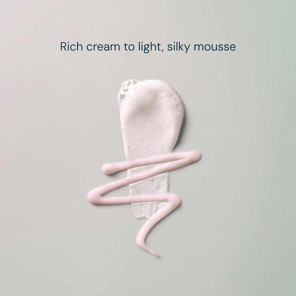 ELEMIS Pro-Collagen Hydrating Cleansing Mousse jar close-up highlights silky texture.