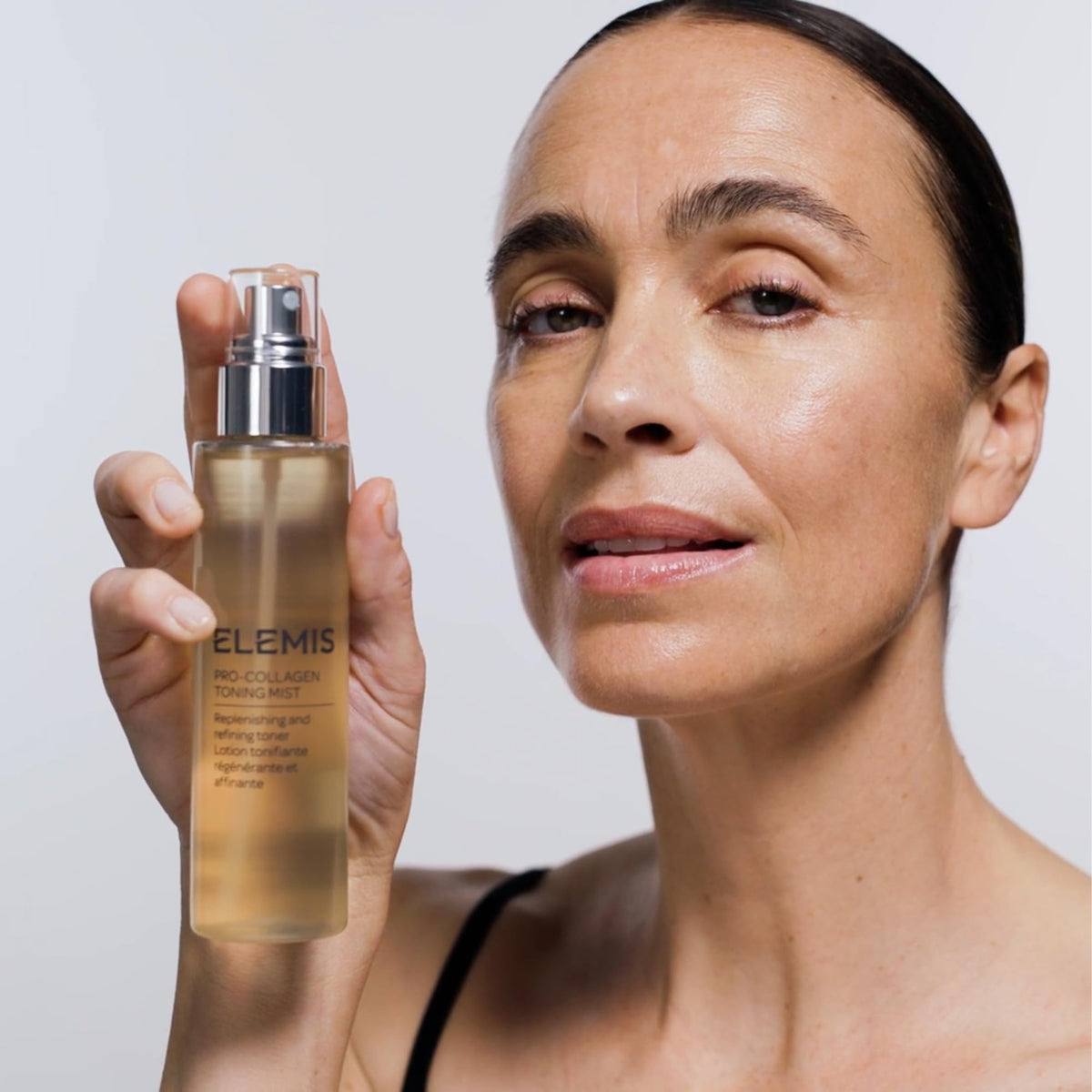 Elemis Pro-Collagen Toning Mist bottle with cotton pad for toning