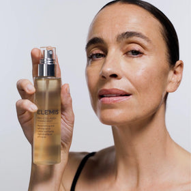 Elemis Pro-Collagen Toning Mist bottle with cotton pad for toning