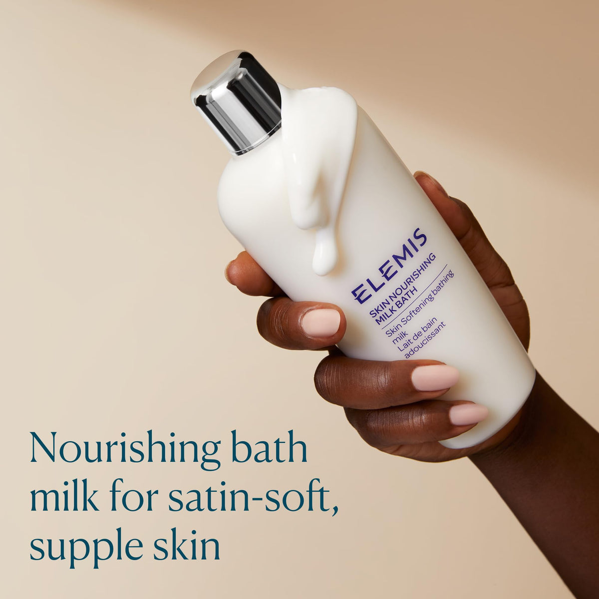 ELEMIS Skin Nourishing Milk Bath pour action demonstrates gentle cleansing and creamy lather.