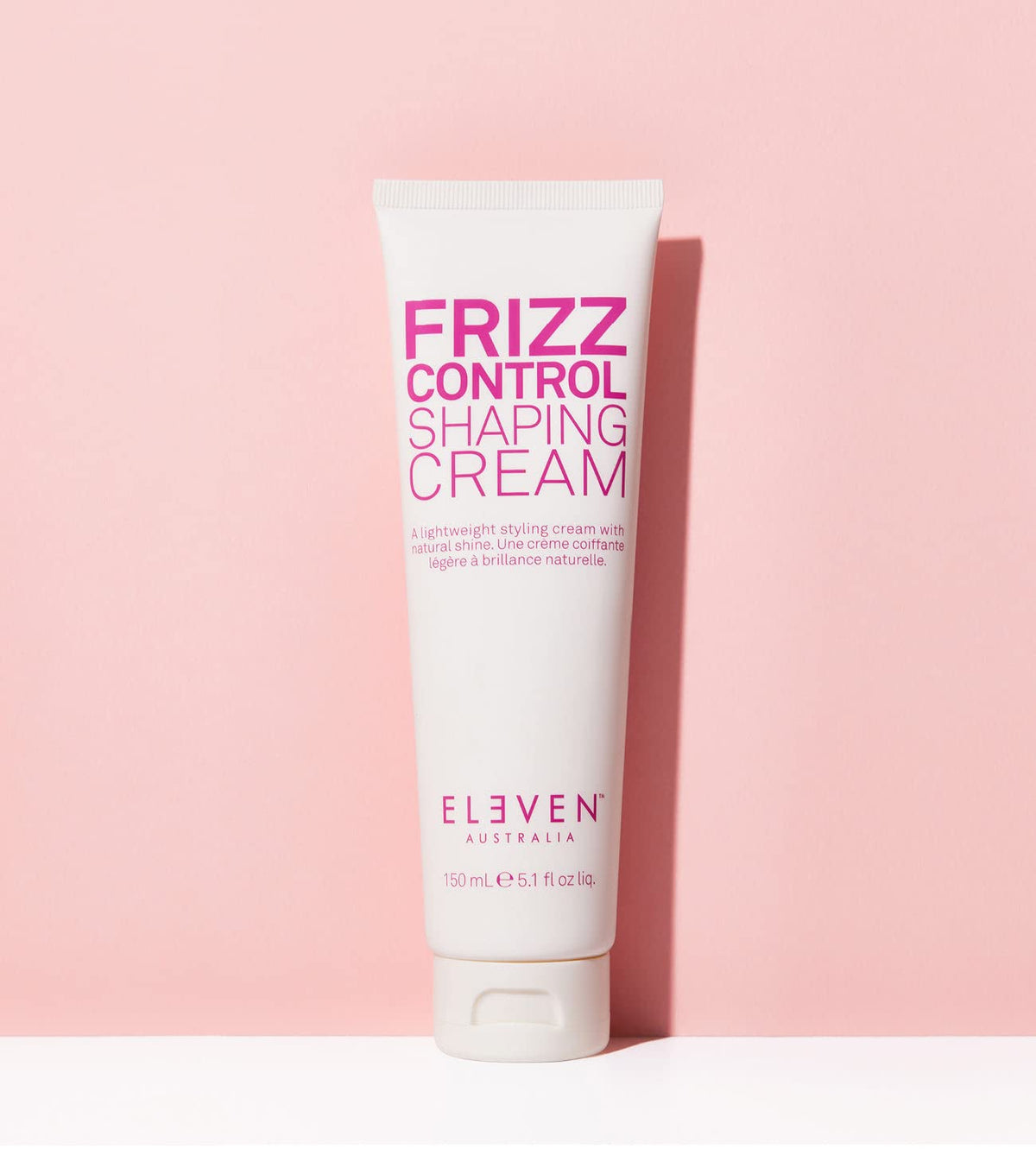 Styled hair showing smooth ends and natural shine after using ELEVEN AUSTRALIA Frizz Control Cream.
