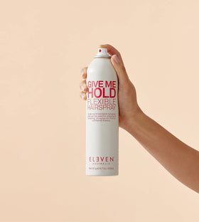 ELEVEN AUSTRALIA Give Me Hold hairspray mist enables quick rework and finish.