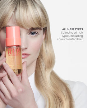 Elegant packaging displayed, suggesting premium heat protection for color-treated hair