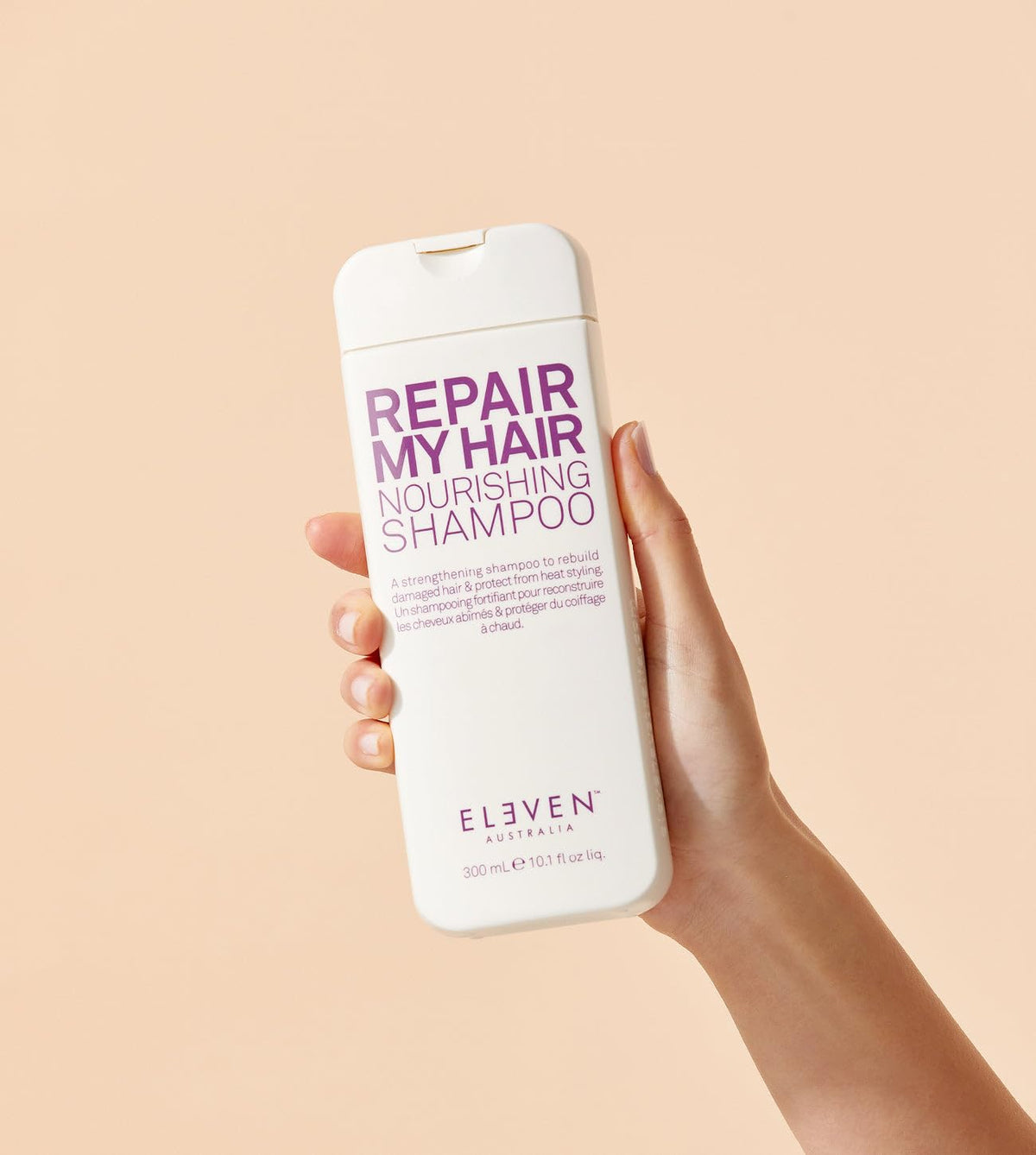 ELEVEN AUSTRALIA Repair My Hair Nourishing Shampoo packaging on shelf