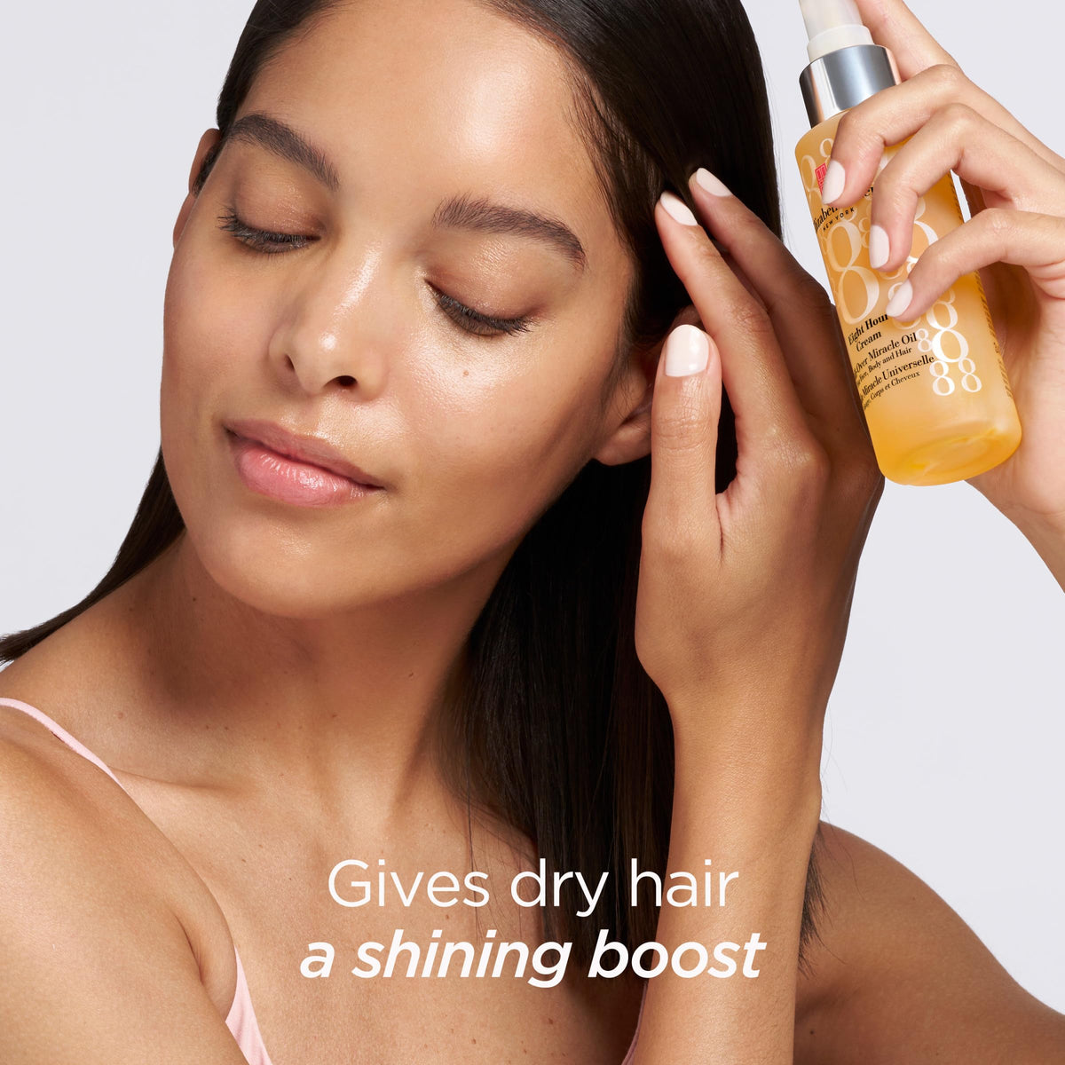 Elizabeth Arden Eight Hour All-Over Miracle Oil bottle close-up showing non-greasy finish.
