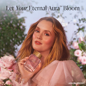 Elizabeth Arden Eternal Aura cap with brushed gold detail, a luxe finish.