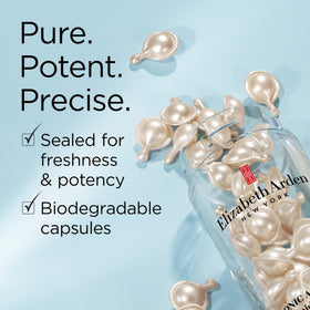 Elizabeth Arden Hyaluronic Capsules on vanity suggesting a radiant, dewy complexion.