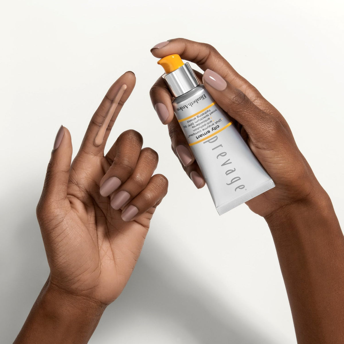 Elizabeth Arden Prevage City Smart texture on hand illustrating lightweight hydration for busy mornings.