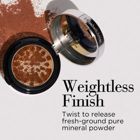Elizabeth Arden Pure Finish Mineral Foundation brush blending for seamless application.