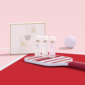 Elizabeth Arden White Tea Eau Florale mini bottle with pink freesia and musk.