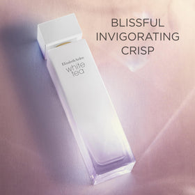 Elizabeth Arden White Tea bottle with warm wood accents for spa like ritual