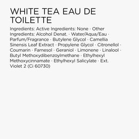 Close-up of embossed branding on White Tea bottle.