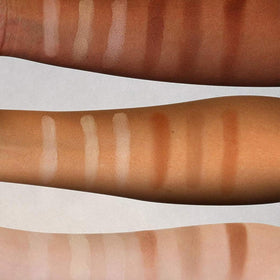Elizabeth Mott defining cheekbones and nose with contour shades