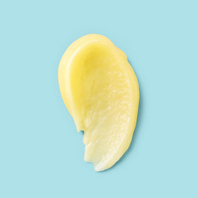 Elizabeth Mott Sure Thing Vitamin C Face Scrub jar with label, highlights brightening potential.