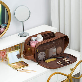 Elviros dark brown Dopp Kit viewed at an angle for stylish travel