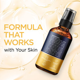 Dropper releasing Ember Cloud Vitamin C Serum onto the skin showing texture and consistency.