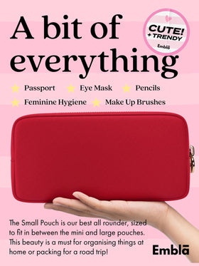 Embla clutch-style makeup bag shown as a chic carry bag for essentials.