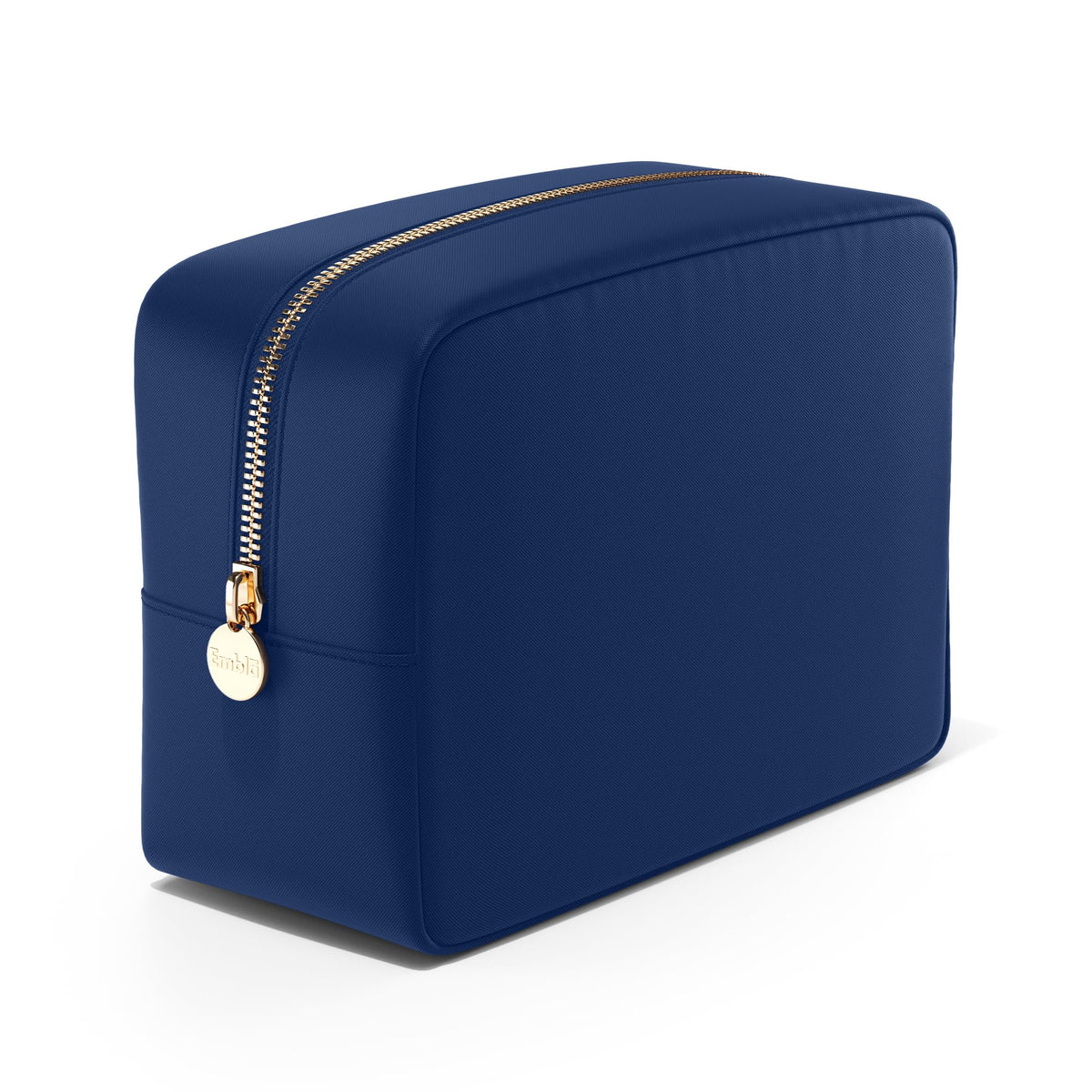Embla large makeup bag in navy showing spacious storage for cosmetics and brushes