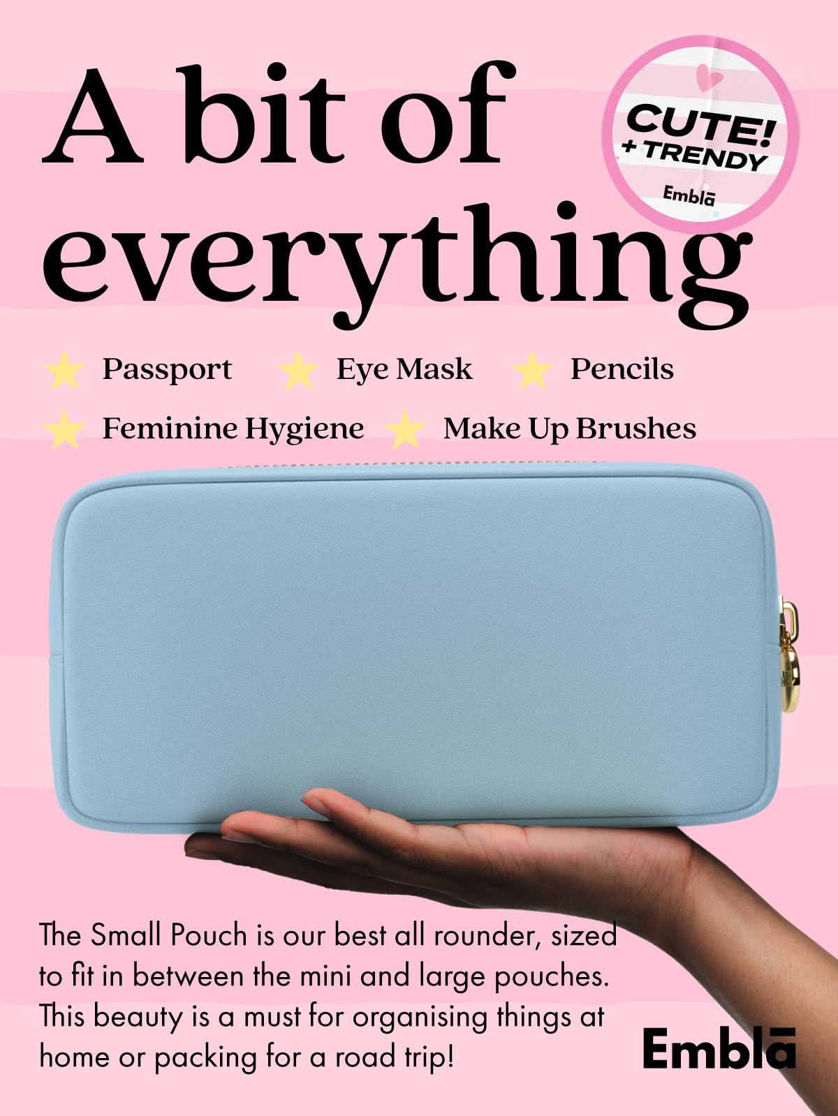 Embla sky blue makeup bag interior highlights secure zipper and easy access.
