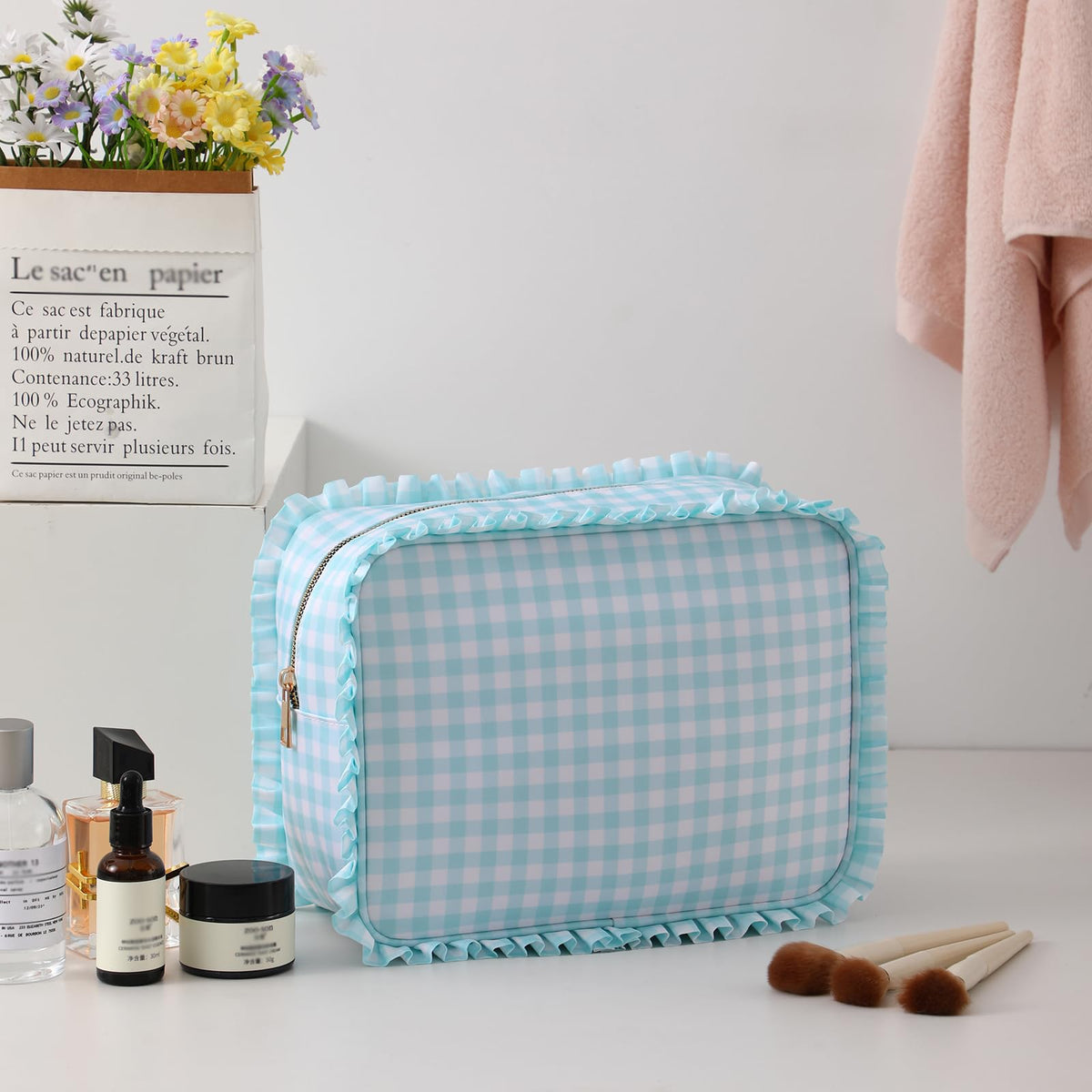 EMBRUNIOICE mint gingham travel cosmetic bag keeps cosmetics neat on the go.