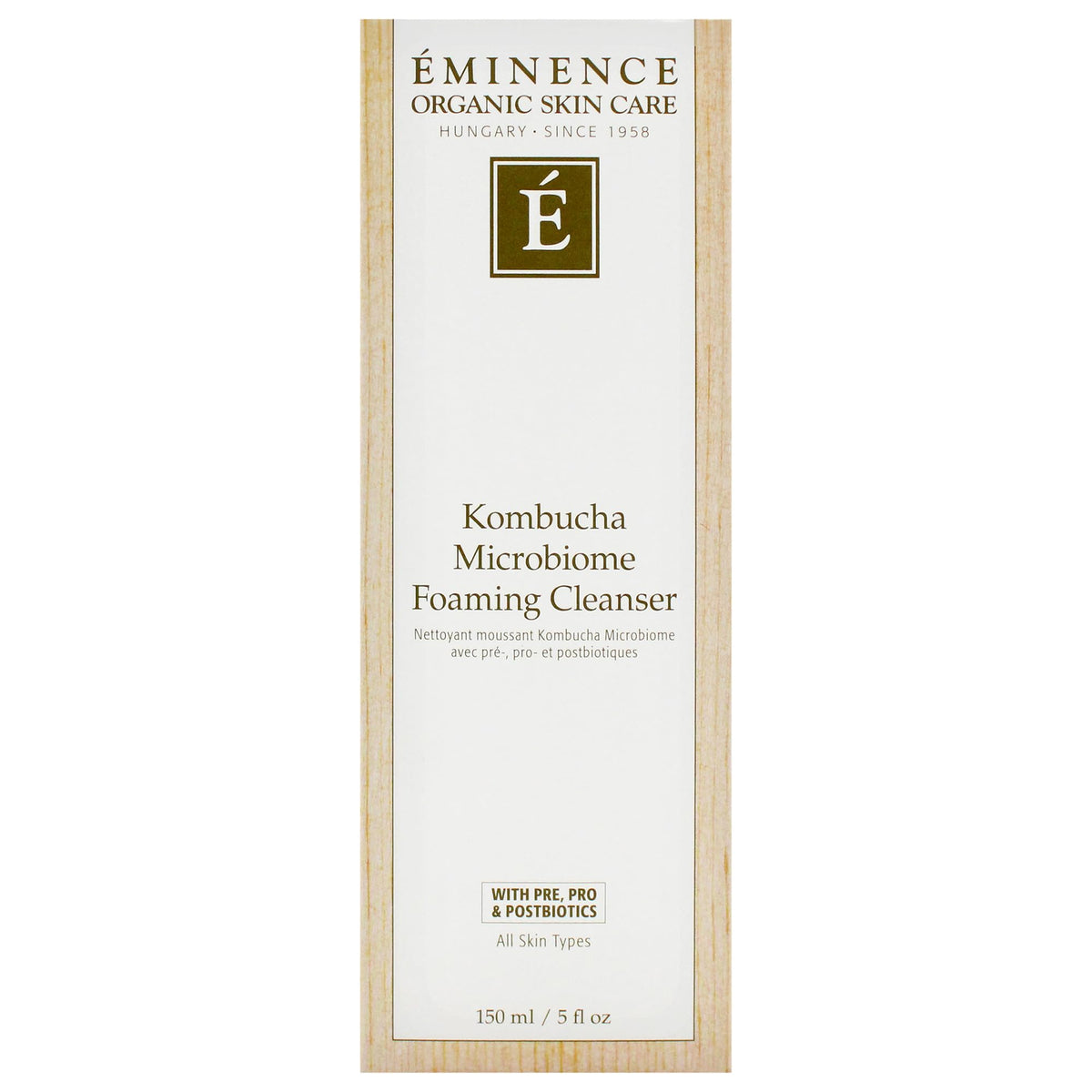 Eminence bottle in a spa-like setting evokes calm, refreshing cleansing ritual.