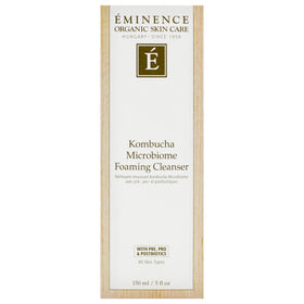 Eminence bottle in a spa-like setting evokes calm, refreshing cleansing ritual.