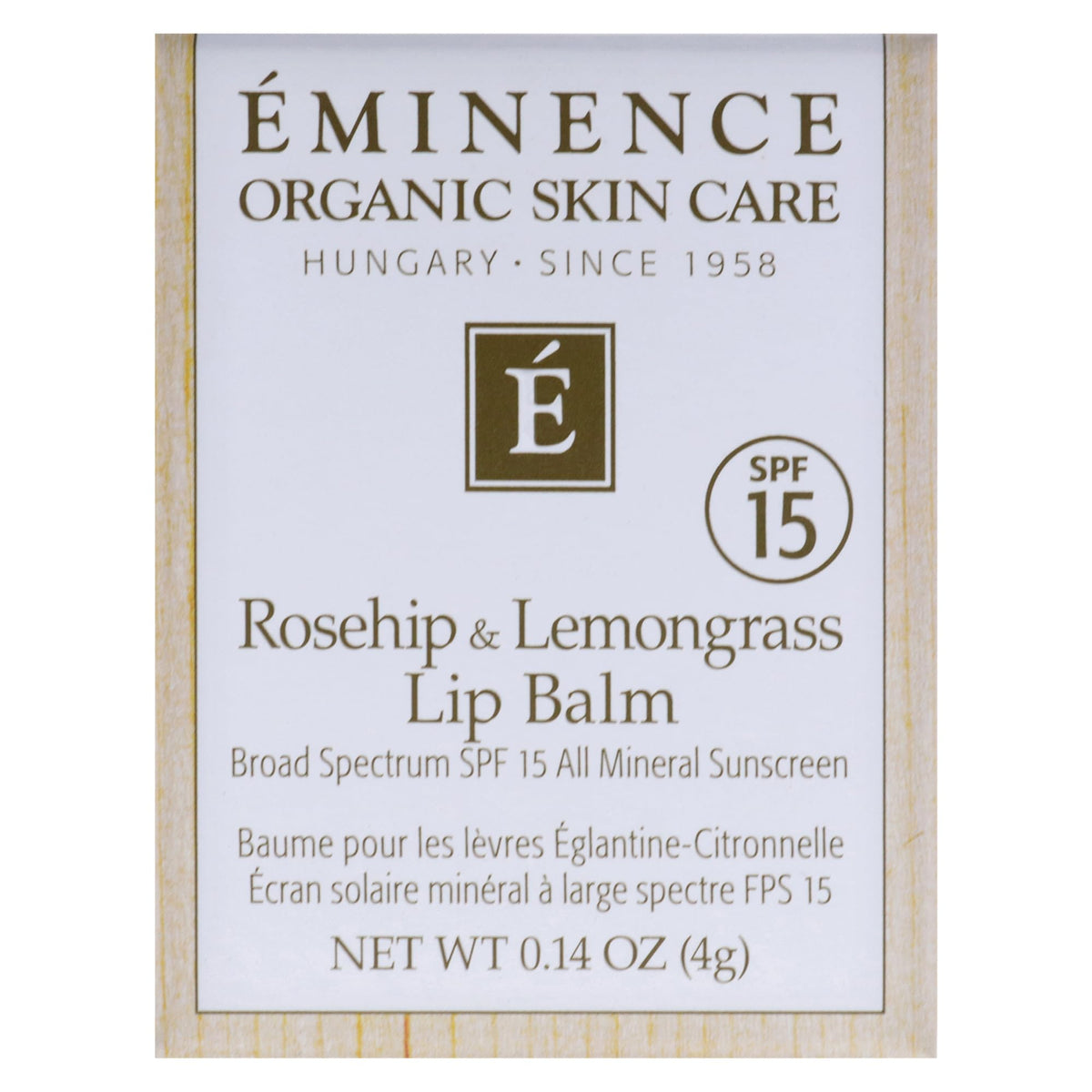 Rosehip oil detail in Eminence lip balm emphasizing nourishing care.