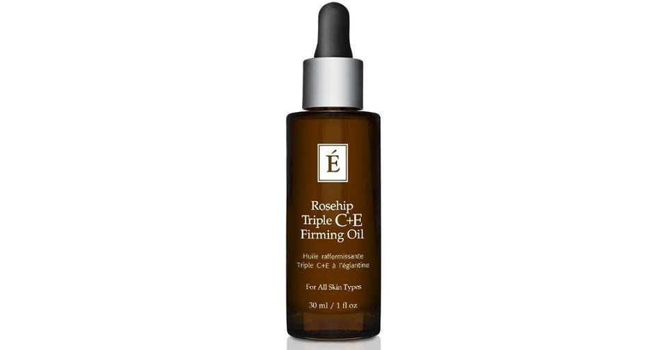 Eminence Rosehip Triple C+E Oil bottle pour for daily facial care and antioxidant protection